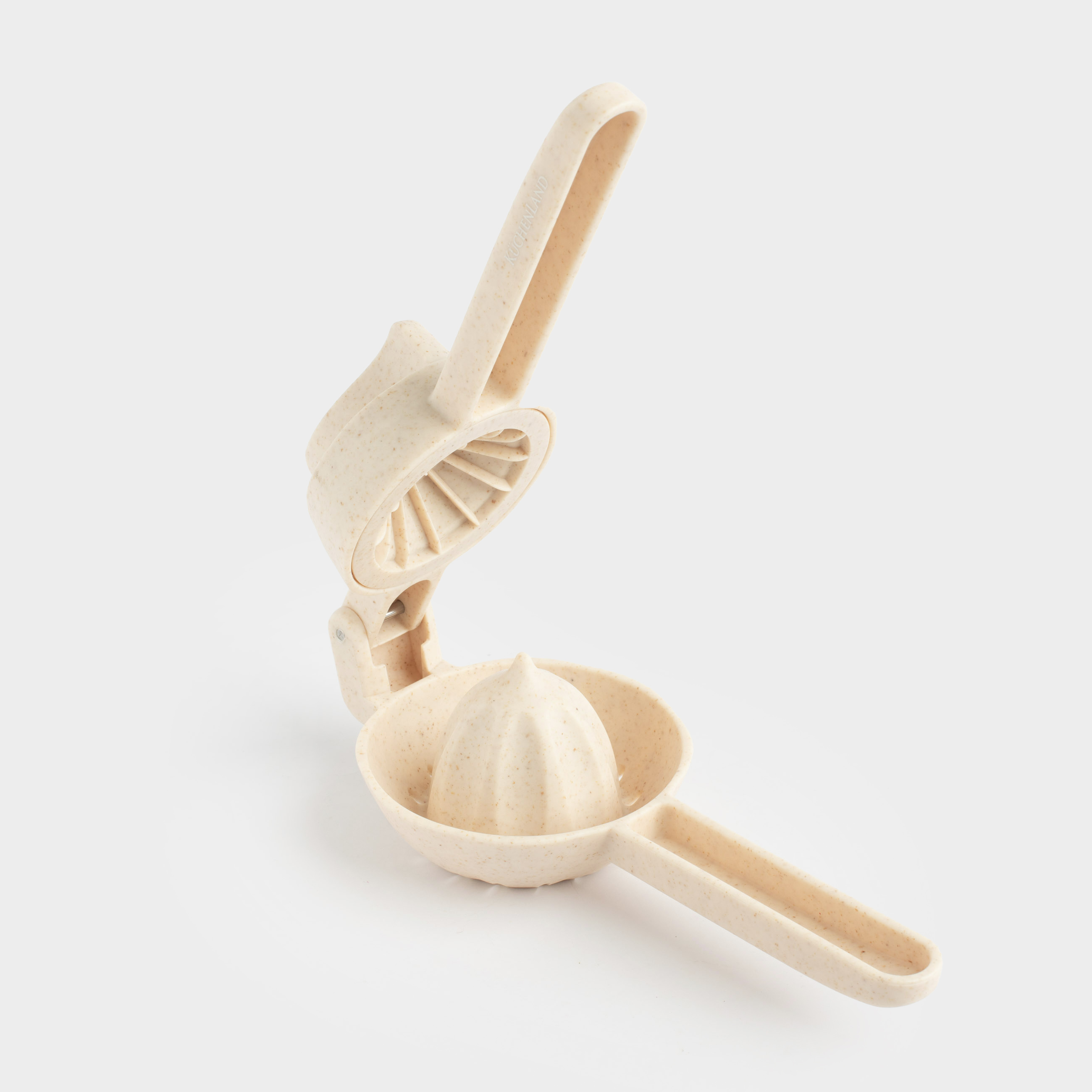 Соковыжималка для цитрусовых 22х10 см с ручкой пластик бежевая в крапинку Soft speckled 499₽